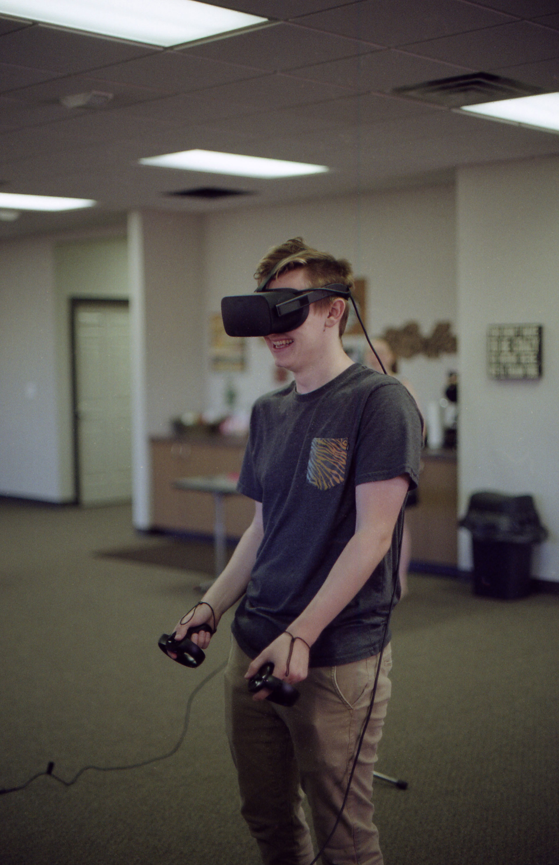 a person playing a game in virtual reality